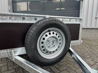 Reservewiel gemonteerd